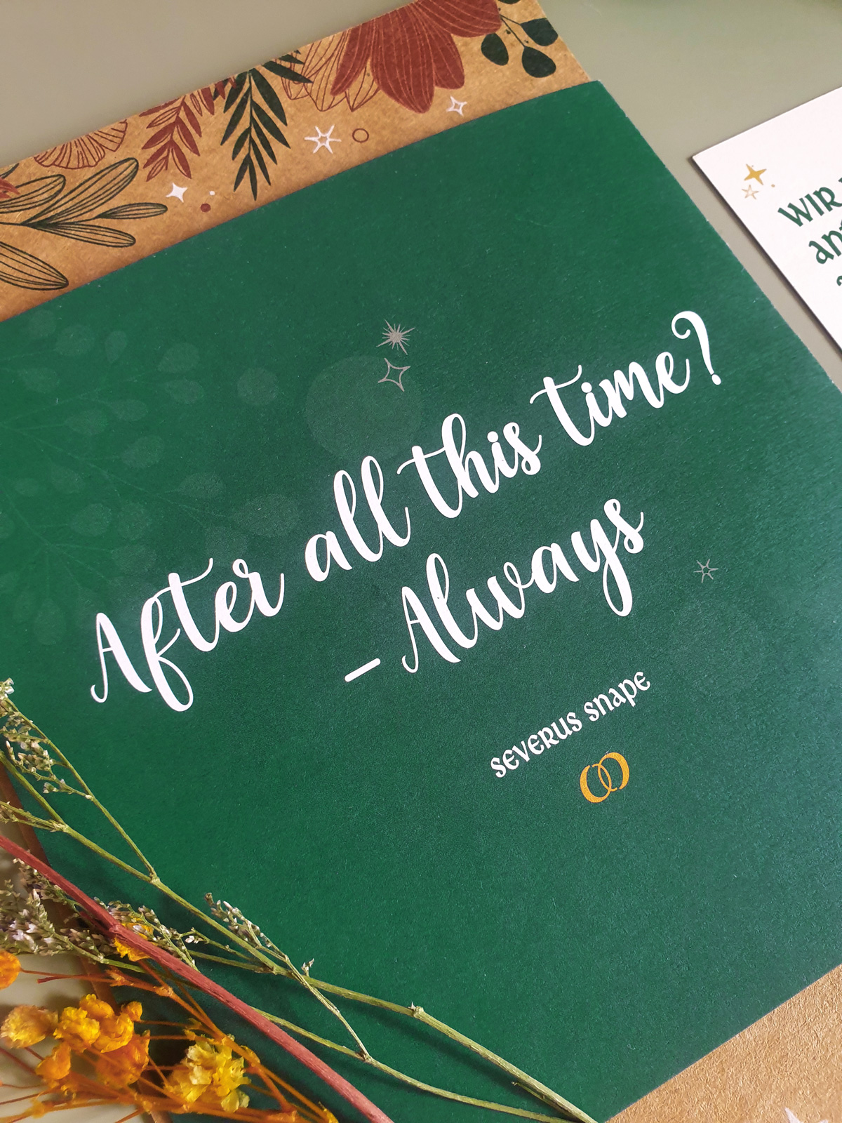 Back of a green wedding Invitation, showing the famous quote of Snape from Harry Potter:"After all this time?"