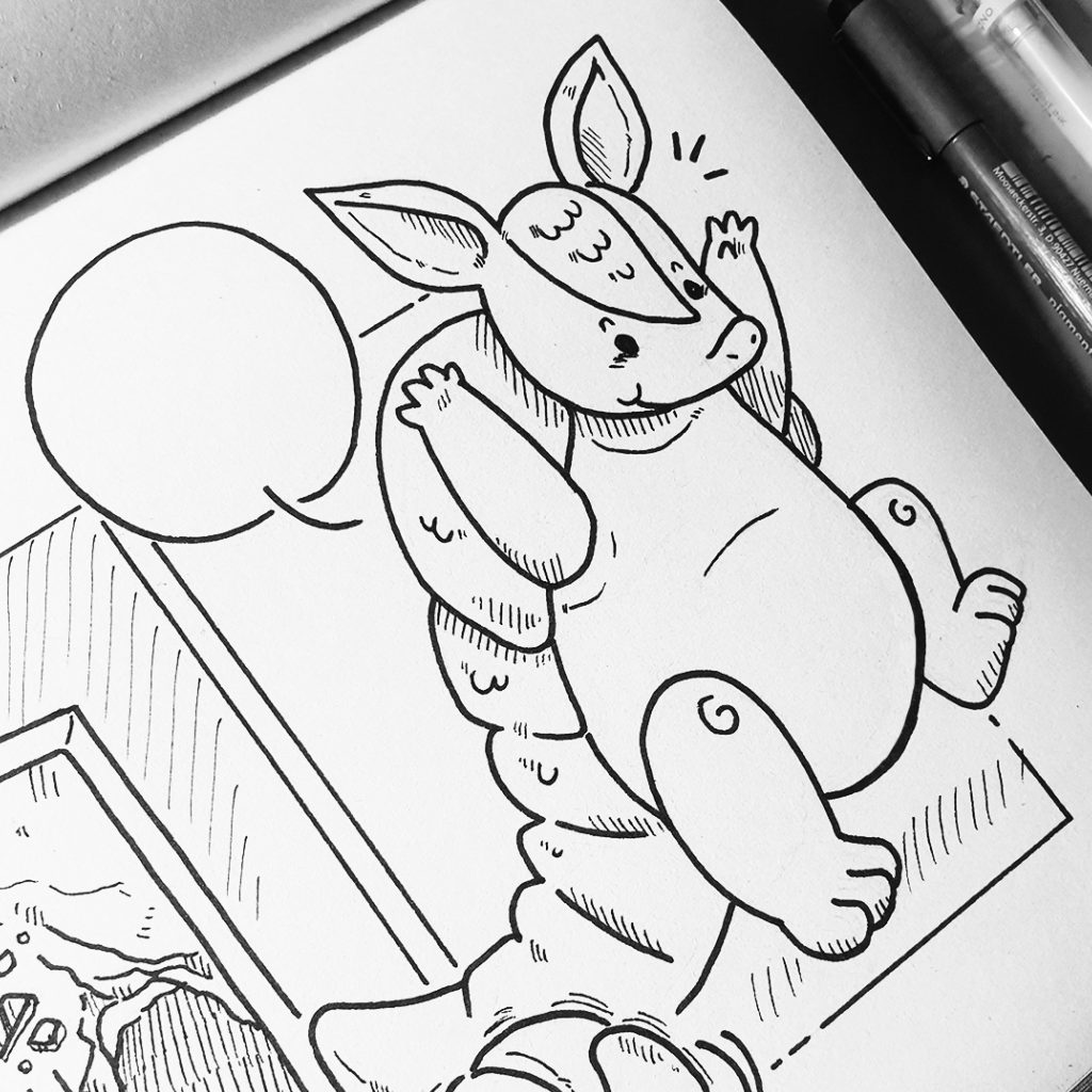 hand drawn illustration on paper shows an armadillo in a children's book